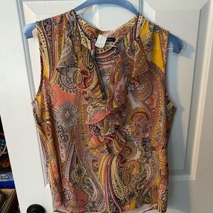 Paisley sleeveless chiffon blouse. Fully lined. Ruffled v neck